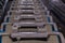 Row of plastic supermarket shopping carts in macro closeup, commercial supermarket background