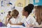 A row of primary school children in class, close up