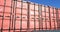 Row of red cargo shipping containers