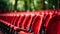 Row of red chairs in an auditorium. Generative AI.