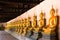 Row of sacred Buddha images in Putthaisawan Temple, Thailand