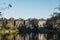 Row of semi-detached houses in Hampstead, facing a pond in Hampstead Heath, London, UK.