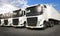 Row of Semi Trailer Trucks Parking at a Blue Sky. Industry Road Freight by Truck. Logistic and CargoTransport concept.