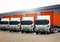 Row of Semi Trailer Trucks on The Parking Lot. Trucks Loading at Warehouse Dock. Freight Truck Logistic