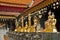 Row of the small golden buddha statuette at Wat Prathat Doi Suthep, Chiang Mai, Thailand