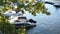 Row of small yachts moored in a yacht club on the Odra River on a sunny autumn day