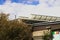 A row of solar panels on an Australian school roof raised to catch the sun.