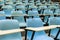 Row stack of chairs in lecture room