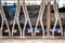 Row of stanchions in a dairy barn made for cattle to eat through and remain seperate.