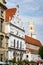 Row of stately older european buildings by trees