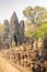 Row of statues leading to a passage way in monumental gate angkor cambodia world heritage site