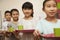 Row of students standing in line in school cafeteria