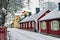 Row of suburban vibrant houses covered in white snow in winter