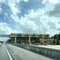 A row of toll booths for people to pay tolls for EPass and Sunpass in Orlando, Florida