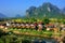 Row of tourist bungalows along Nam Song River in Vang Vieng, Vie