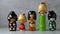 Row of traditional Japanese wooden kokeshi dolls close up