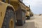 Row Of Trucks At Landfill Site