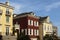 A row of upscale houses against blue sky