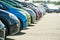 row of used cars. Rental or automobile sale services