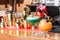 Row of various colourfull alcoholic cocktails on on the bar counter. Glasses of differen shapes. Cocktail card. Bar menu.