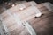 Row of vintage wine barrique barrels in a winery cellar