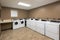 Row of washing machine of laundry business in the public store. Generative AI