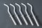 Row of white new modern hooks for mount aluminum or bimetallic radiators for heating house