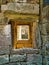 A row of windows in temple ruins at the ancient Khmer site of Angkor Thom near Siem Reap in Cambodia