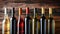 Row of Wine Bottles on Wooden Table