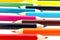 Row of wooden colour pencils