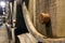 Row of wooden porto wine barrels in wine cellar Porto