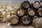 Row of wooden porto wine barrels in wine cellar Porto