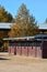 Row of Wooden shedrow stabling at Twin Rivers Ranch