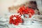 Rowan berries on a wooden table. Autumn background. Autumn still-life.