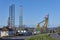 The Rowan Norway Rig and the Asian Hercules III Sheerleg Crane, in Dundee Port.