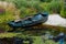 Rowboat in a garden pond