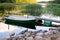 Rowboat stored near wooden jetty