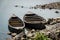 Rowboats Anchored Along the River