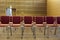 Rowed chairs in a wooden concert hall