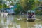 Rowing boat across river