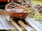 Rowing boat in dry dock. Traditional wooden rowboat on land.