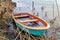 Rowing boat in the ice on a frozen lake