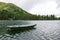 Rowing boat on mountain lake