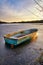 Rowing boat stuck in the ice on a frozen lake