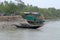 Rowing boat in the swampy areas of the Sundarbans, India