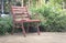 à¸ºrown bench in garden,vintage filtered.