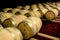 Rows of barrels disposed on a wine cellar