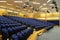 Rows of blue seats in a lecture theatre