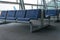 Rows of blue waiting chairs at the airport