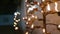 Rows of burning oil lamps at Buddhist temple in Vesak night. Peaceful flame lights reflect spiritual atmosphere